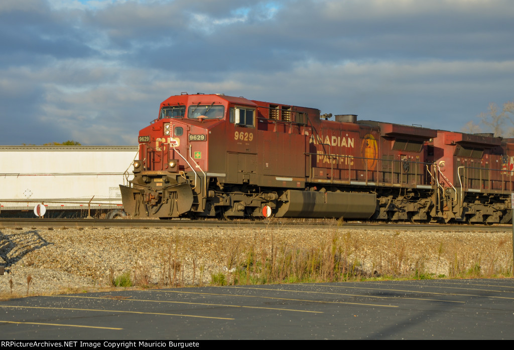 CP AC44CW Locomotive leading a train